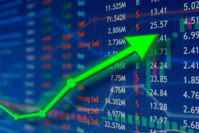 Investing and stock market concept gain and profits with faded c